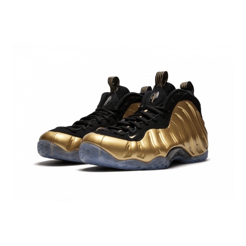 The black and sale gold foamposites