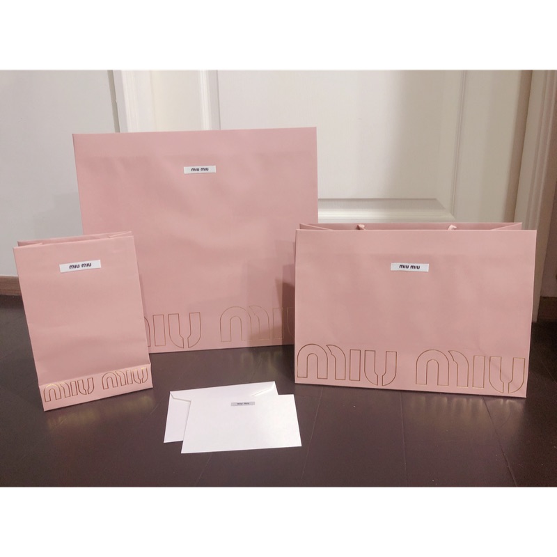 miumiu 紙袋 THE ROW 紙袋 5枚 miumiu 紙袋6枚 ハンガー2本レシート入り