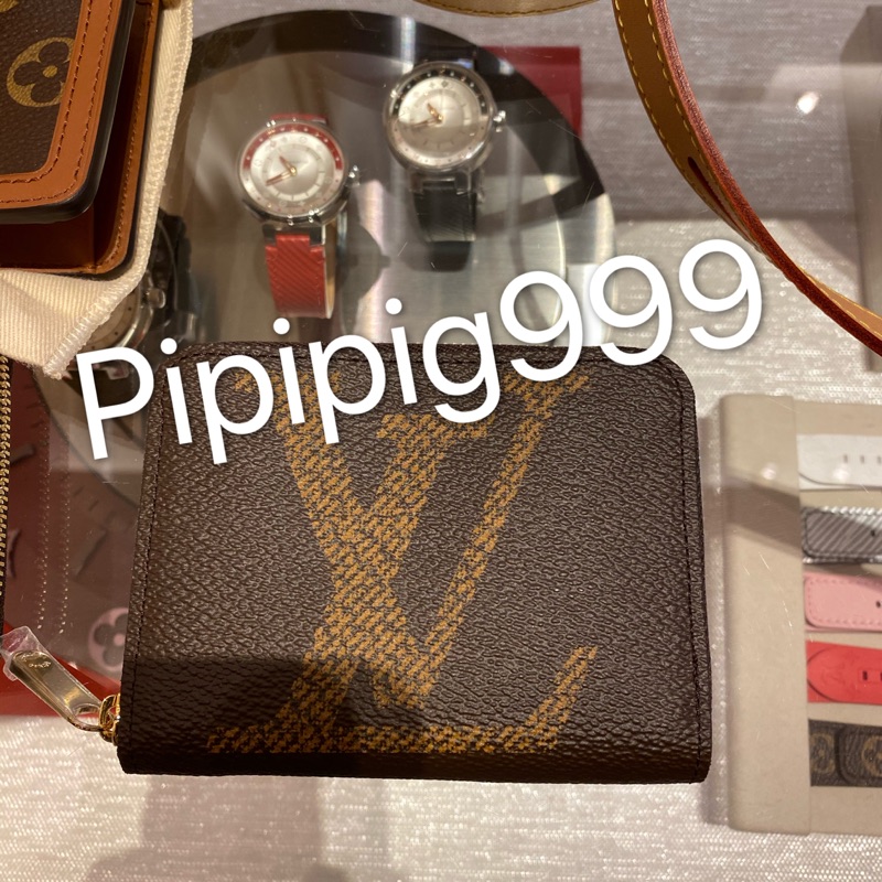 Louis Vuitton ZIPPY COIN PURSE Logo