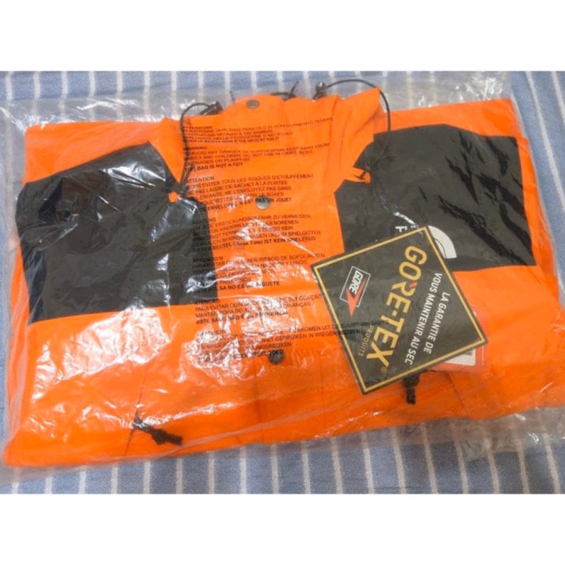 The north face hot sale 1990 mountain jacket orange