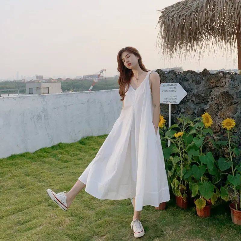 韓國新品簡約純白色吊帶連衣裙女21韓版寬鬆顯瘦沙灘長裙超仙氣外出洋裝休閑隨性舒適白色雪紡連身裙女Ins 批發價|