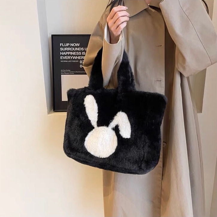 Fluffy white bag discount with black flowers