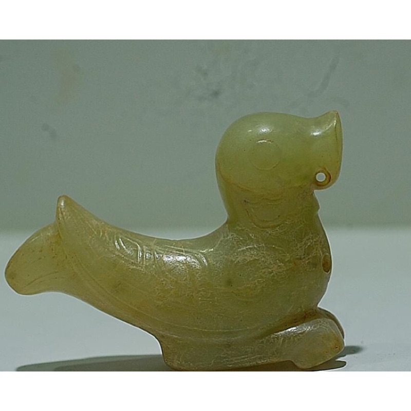 A white jade 'kuilong' pendant, Qing dynasty, 18th / 19th