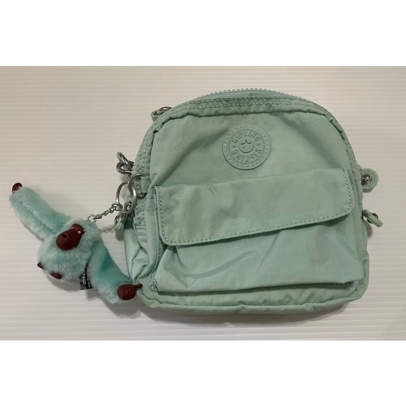 Kipling hot sale puck bag