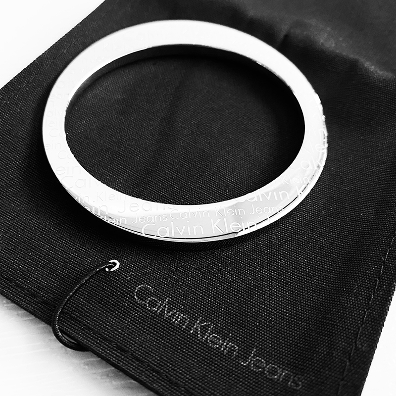 美國百分百【全新真品】Calvin Klein 手環 CK 金屬 飾品配件 不鏽鋼 logo滿版 銀色 CF28 | 蝦皮購物