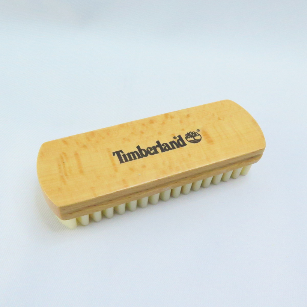 Timberland eraser and on sale brush