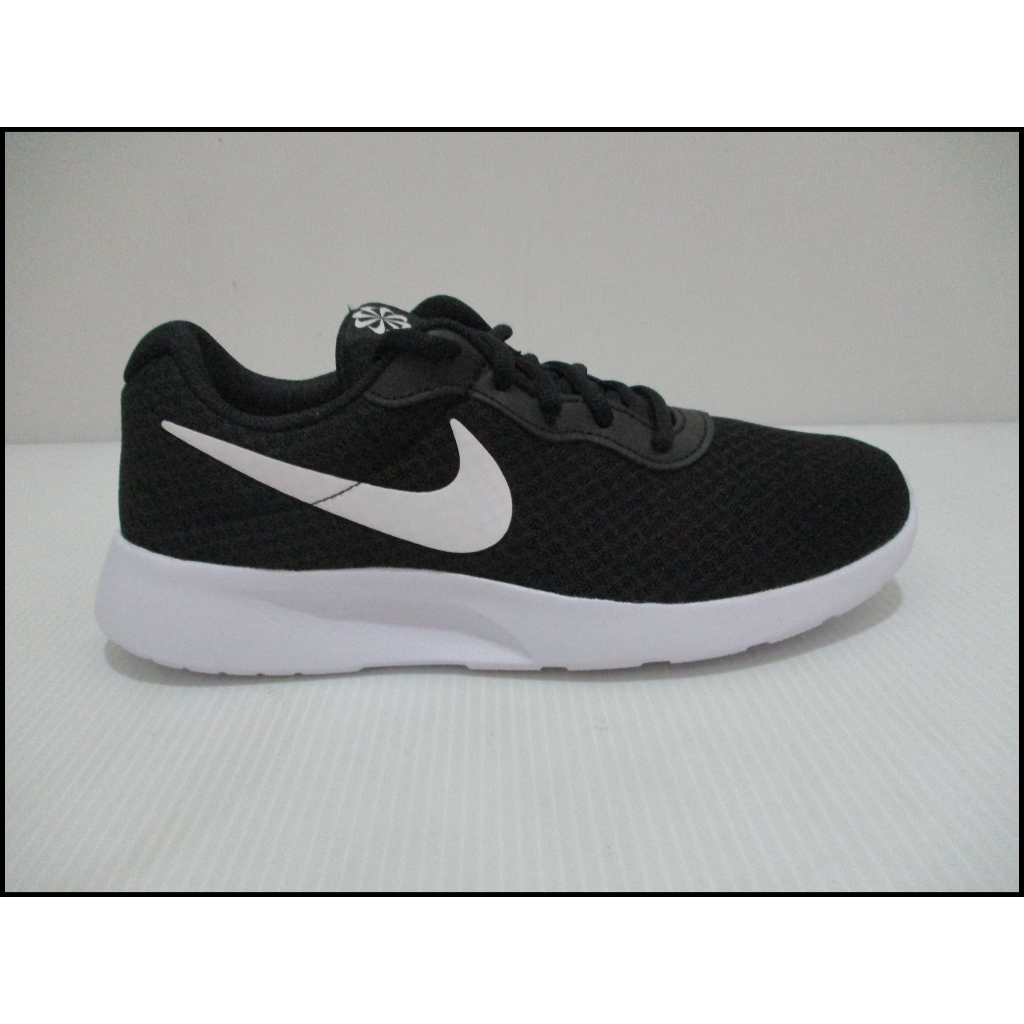 Nike tanjun price store