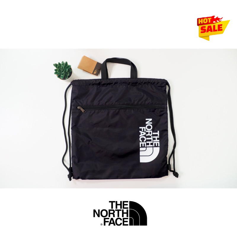 The north store face drawstring bag