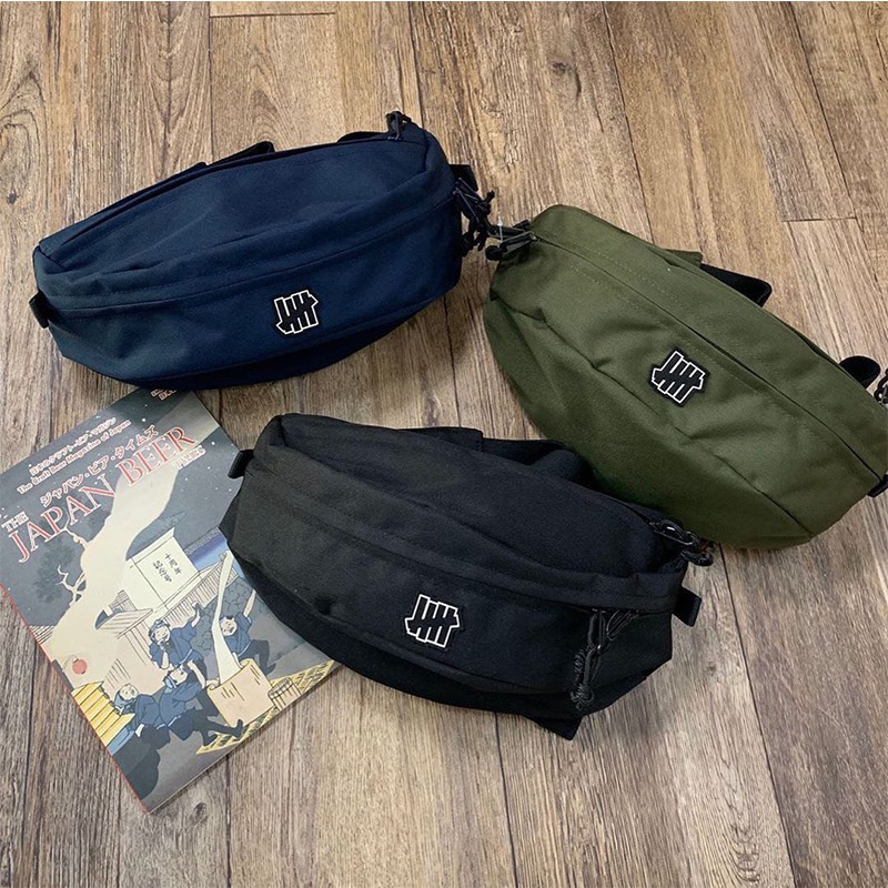 21Ss UNDEFEATED WAIST BAG日本限定發售logo 腰包 三色 戶外隨身 包 男女款 日本🇯🇵代購中