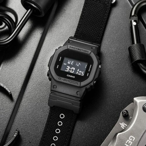 金台鐘錶】CASIO卡西歐G-SHOCK 黑色反轉液晶顯示(消光黑) 尼龍布料DW