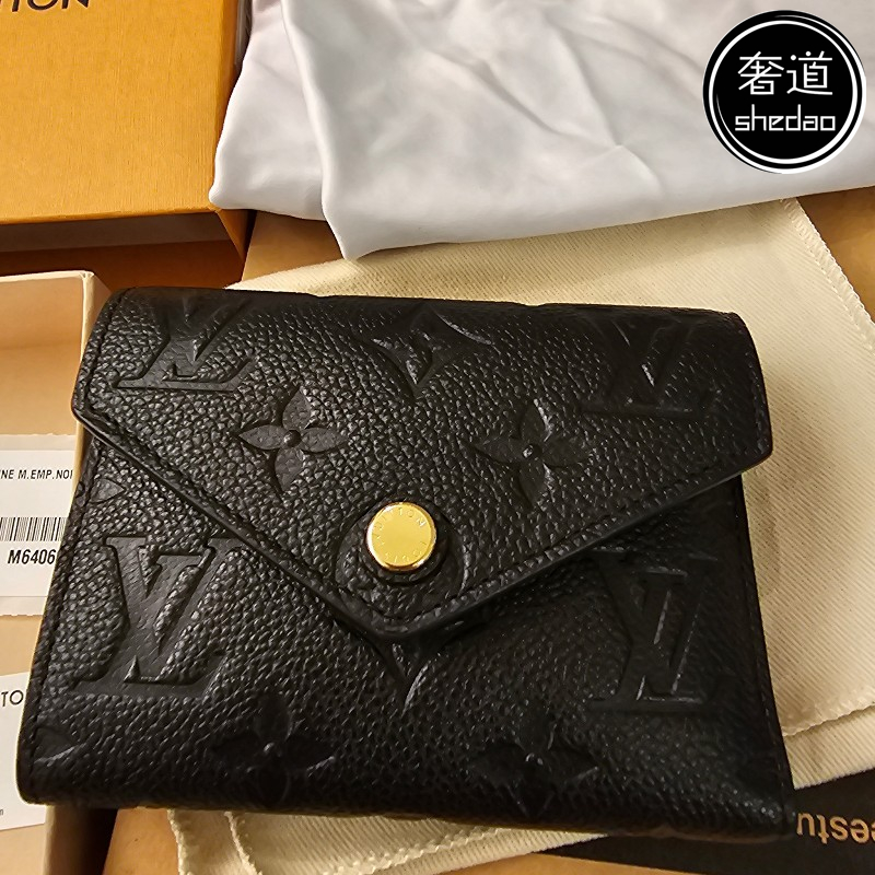 Louis Vuitton MONOGRAM EMPREINTE Victorine Wallet (M80968) in 2023