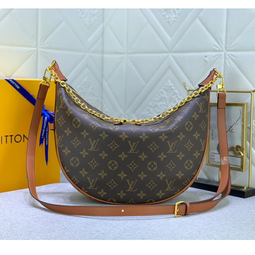 Authentic LOUIS VUITTON Taurillon monogram s lock messenger M58489