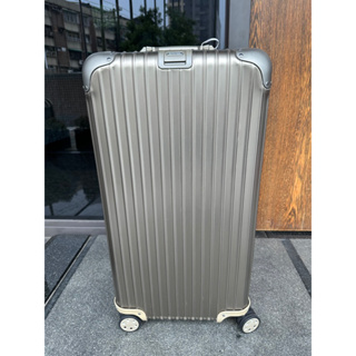 Shop RIMOWA TOPAS TITANIUM RIMOWA TOPAS Titanium Suitcase 98L by MTLQC