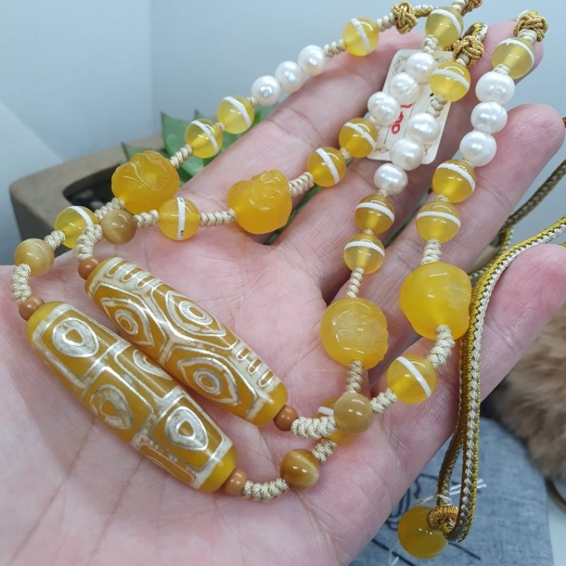 法衣天珠Zi1203佛心九眼天珠。龍六眼天珠39.3×12.2×12.1搭配大鵬12。屍